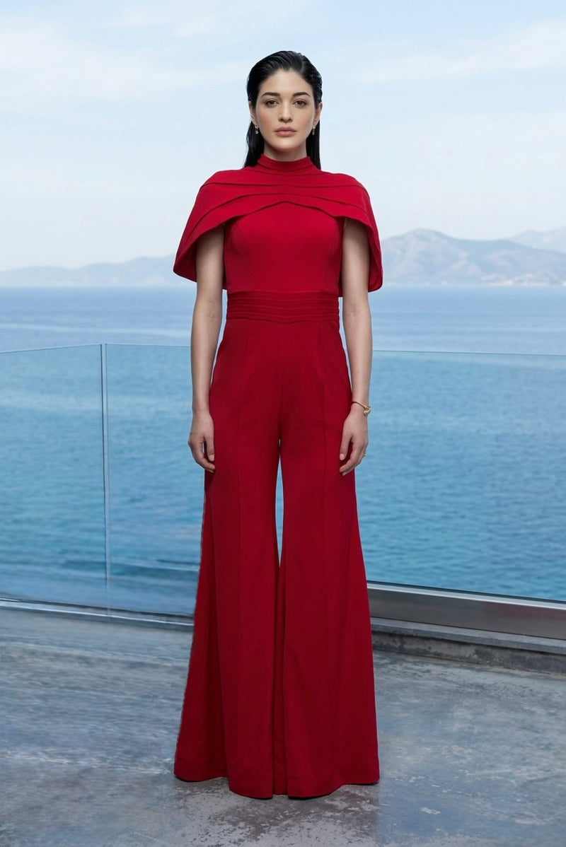 Signature cape jumpsuit in red