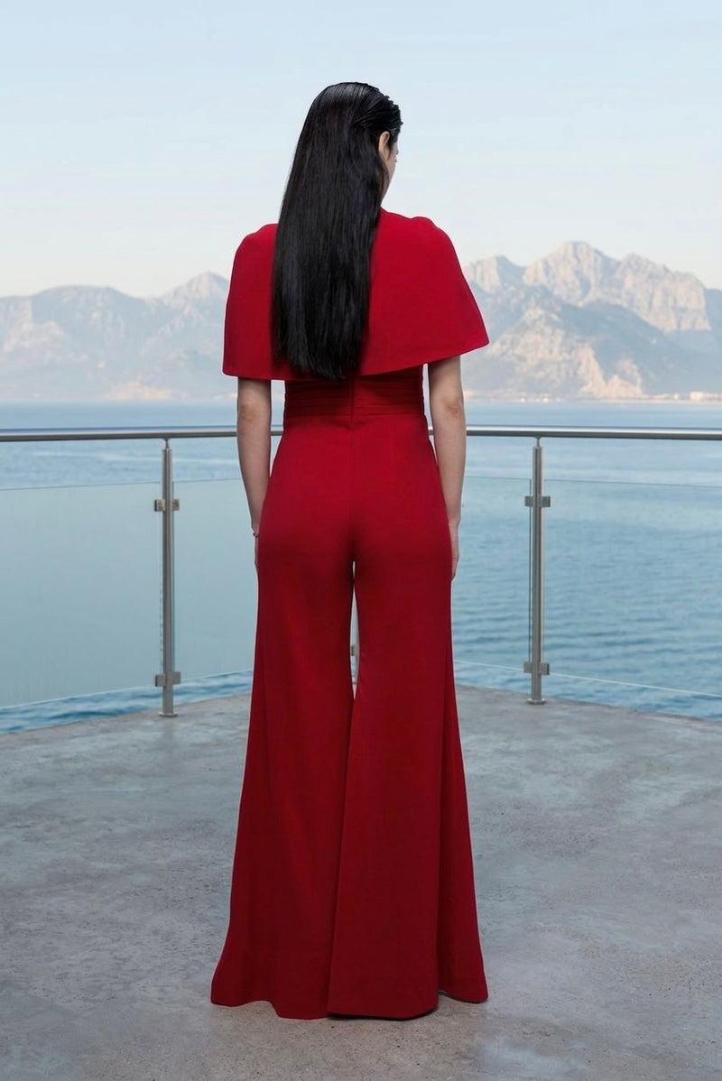Signature cape jumpsuit in red