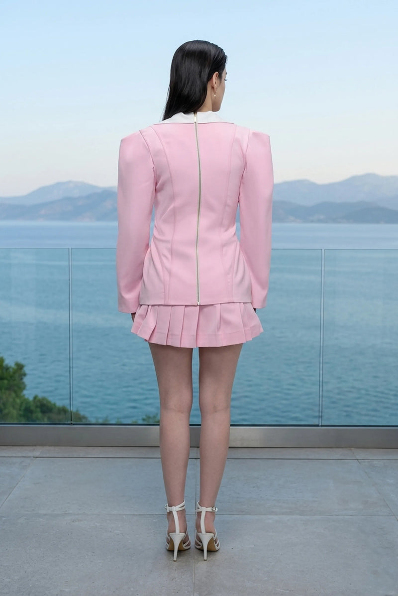 Double-breasted balzer top with pleated mini skirt in blush pink